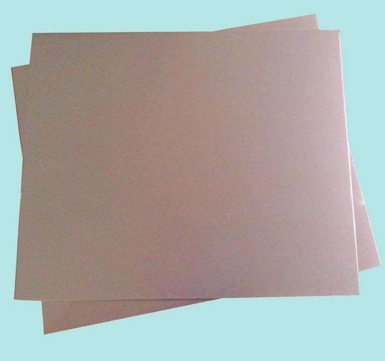 Copper-clad laminate sheets prepared for a prototype PCB build