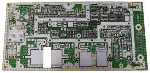 High-frequency PCB with dense RF microstrip routing, shielded ground stitching and exposed coplanar waveguide sections on a green soldermask board